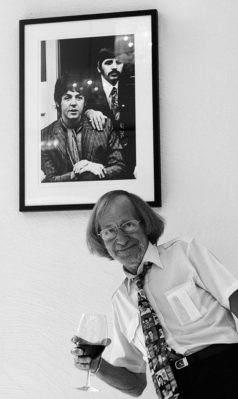 Jan Olofsson, photographer at an exhibition of his sixties photos.